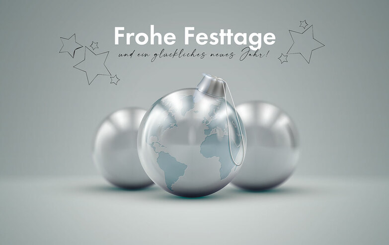 Weihnachtskarte: Die Welt ist eine Kugel